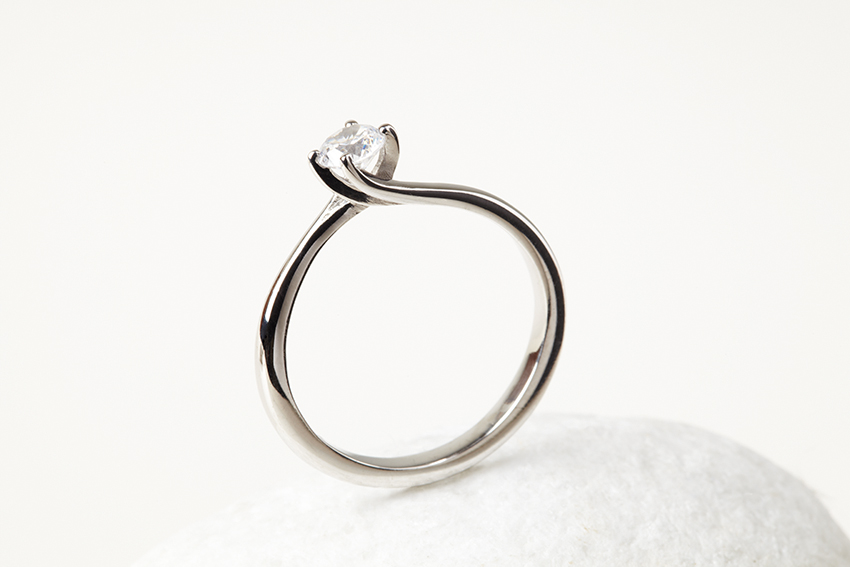 Fairmined Gold Engagement ring - Classic Twisted Claw holding a  diamond
